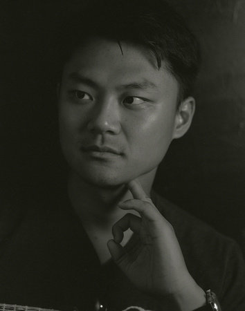 A portrait of the author Yiming Ma in black and white