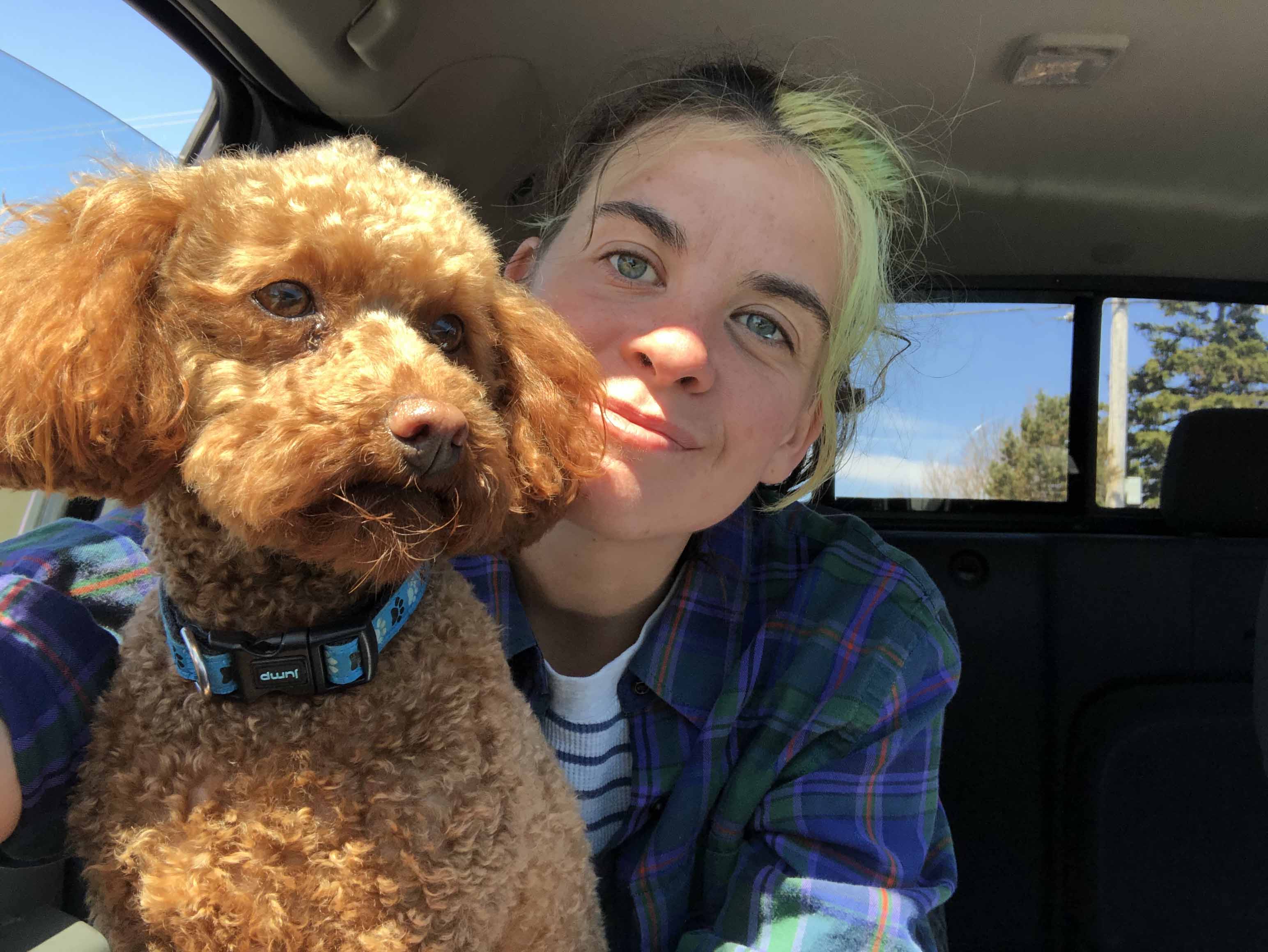 The author with her dog in her lap