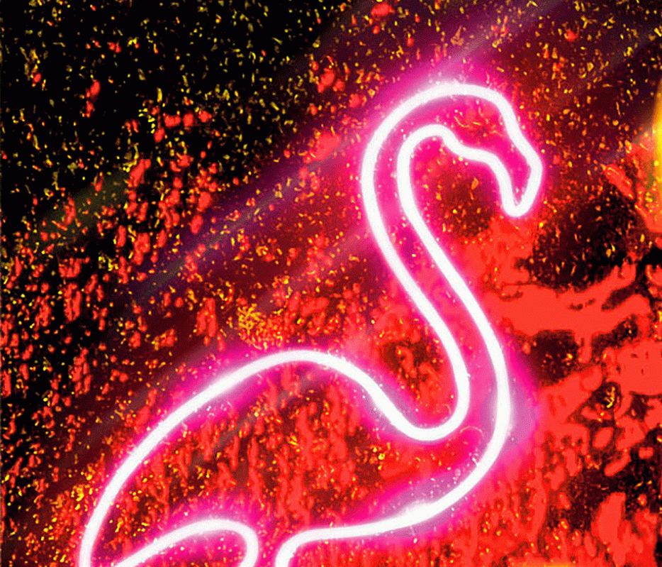 A neon sign shaped like a pink flamingo. 