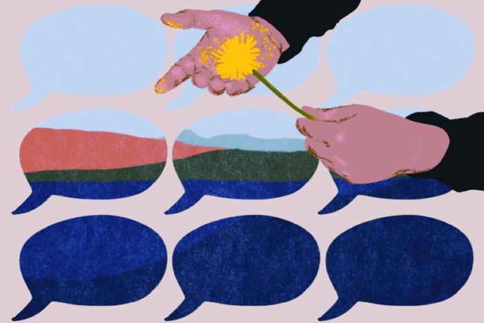 hands hold a flower; in the background speech bubbles encompass a landscape 