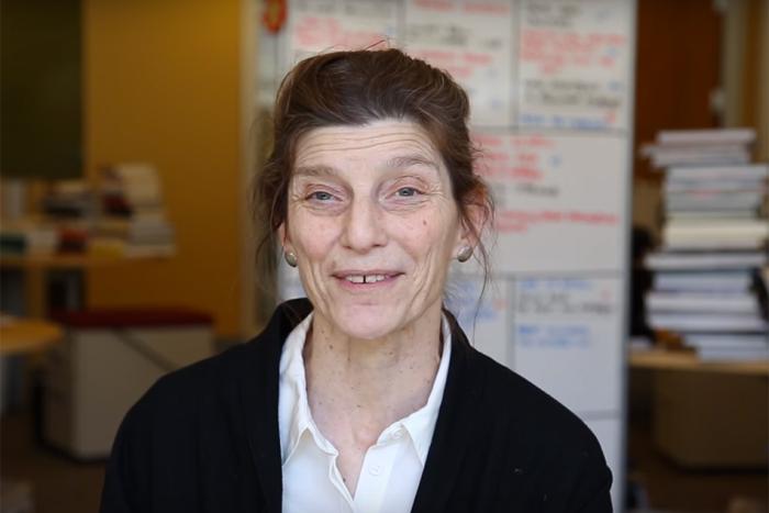 Headshot of a smiling older woman.